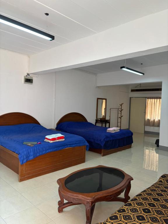 Postel nebo postele na pokoji v ubytování My Hotel Bangkok Noi
