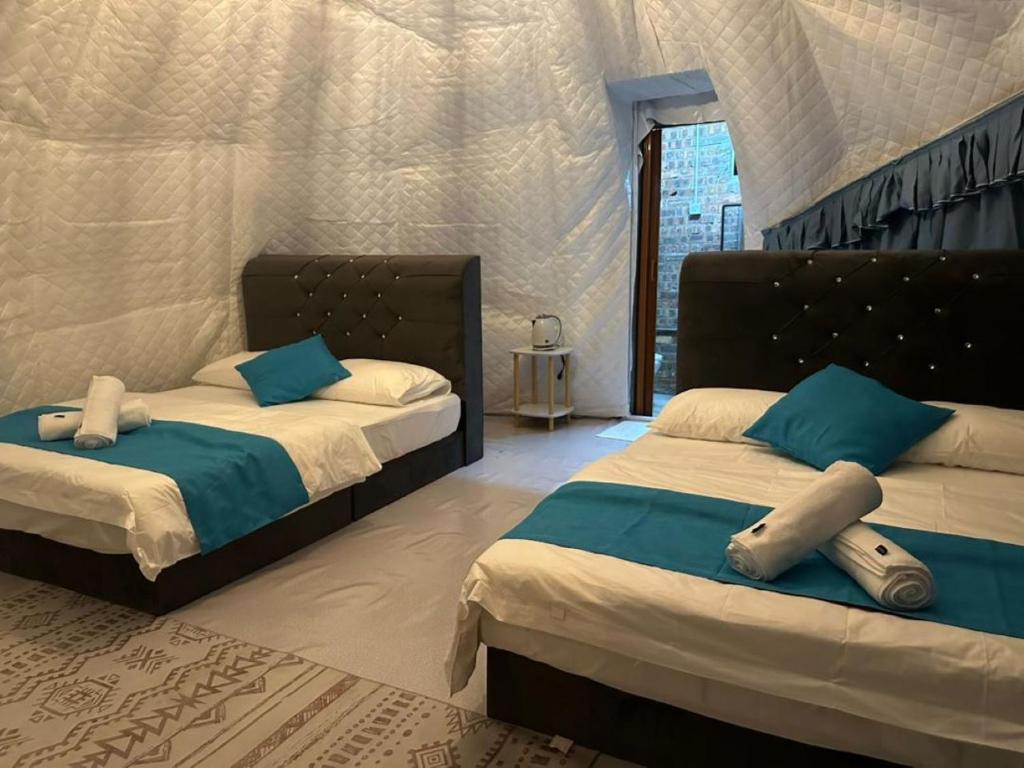 Postel nebo postele na pokoji v ubytování Dnamie Glamping - Lux Tent