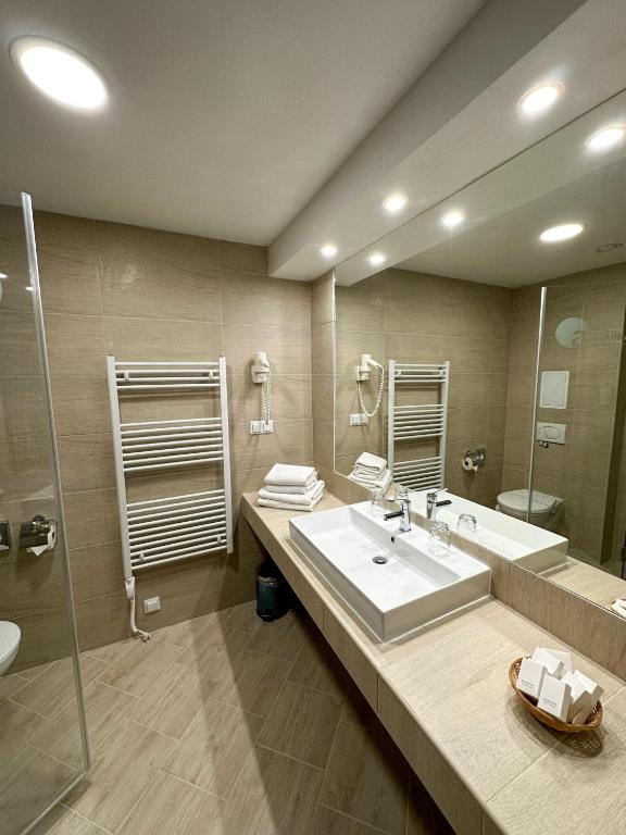 Koupelna v ubytování Hotel Aurora