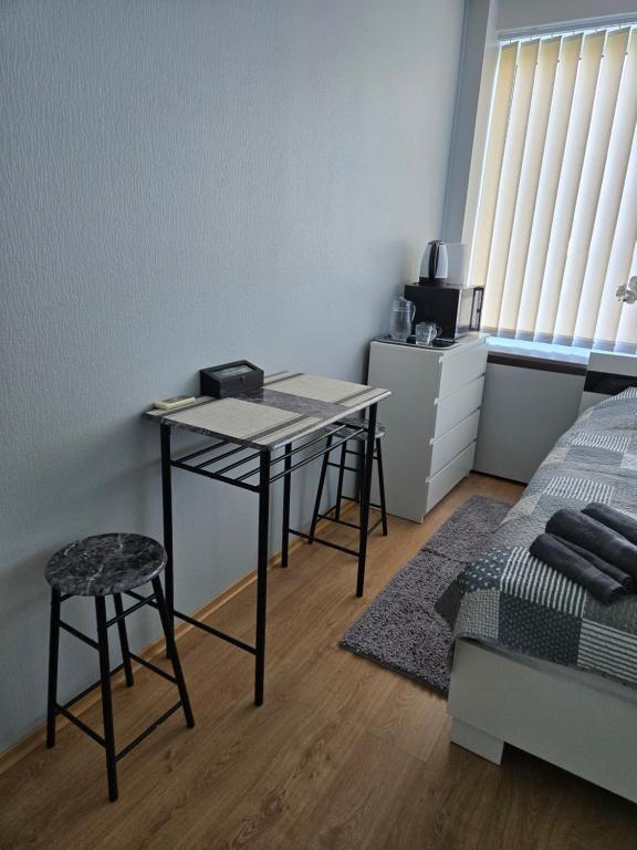 Postel nebo postele na pokoji v ubytování Transhostel ORHIDEJA