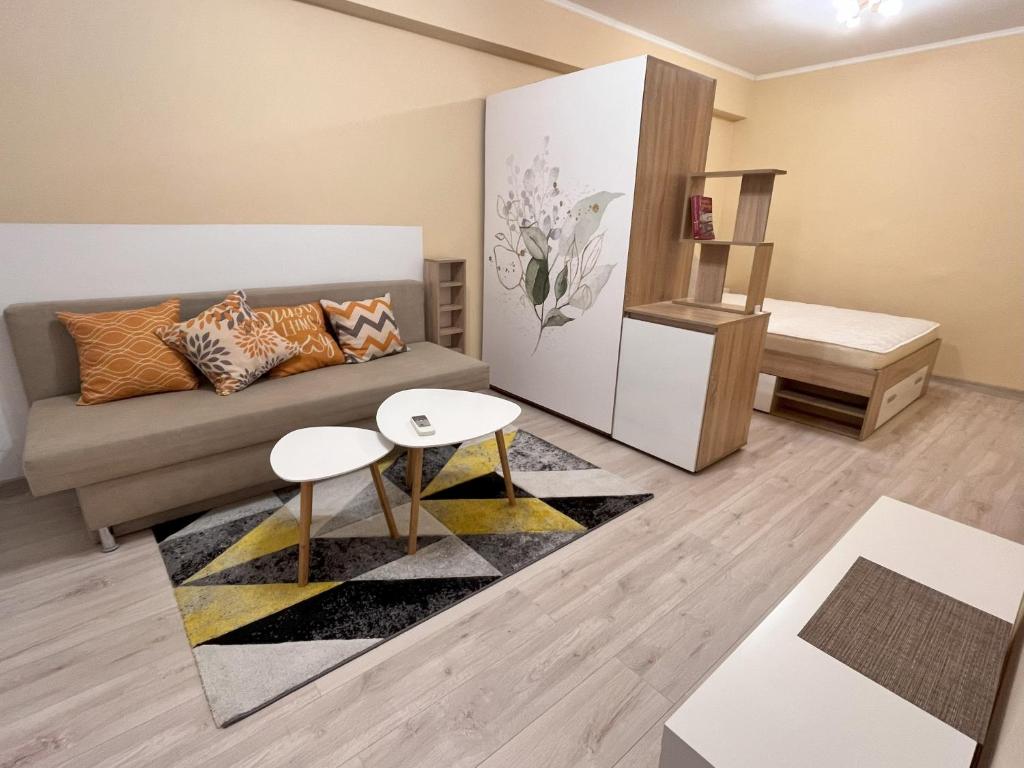Posezení v ubytování Cozy apartment near city center