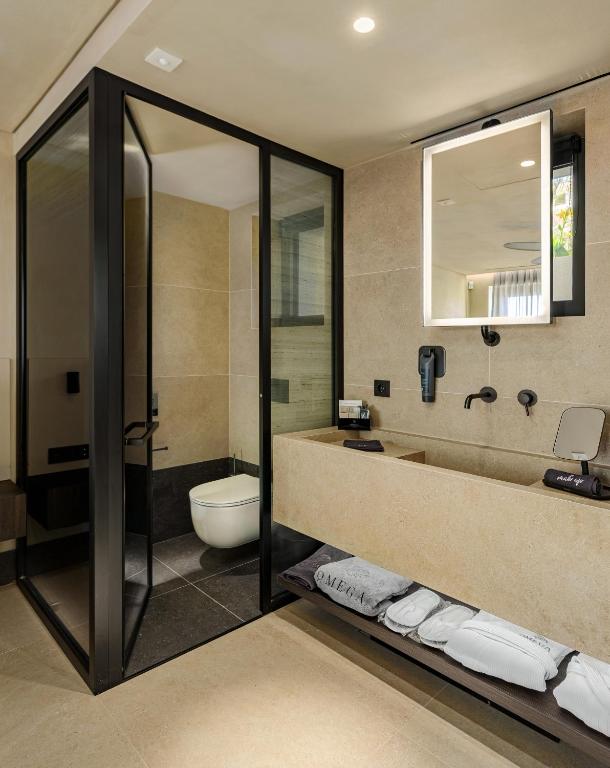 Koupelna v ubytování Omega Residences