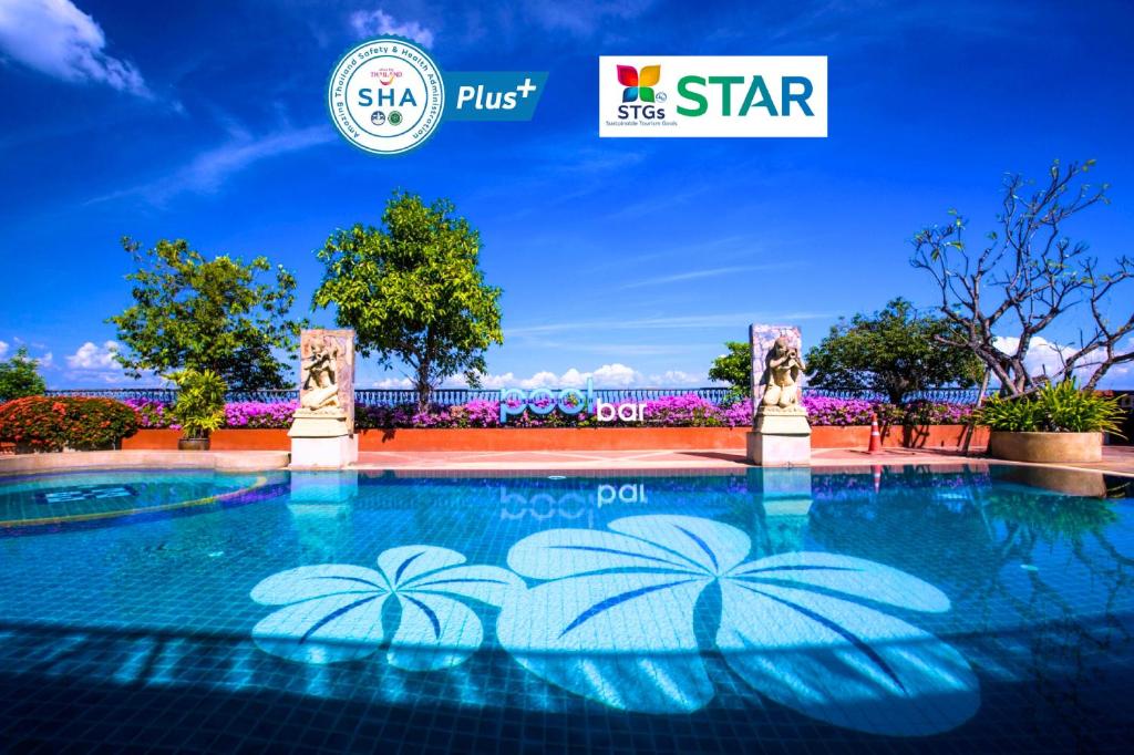 a pool at the star resort and spa at Furama Chiang Mai in Chiang Mai