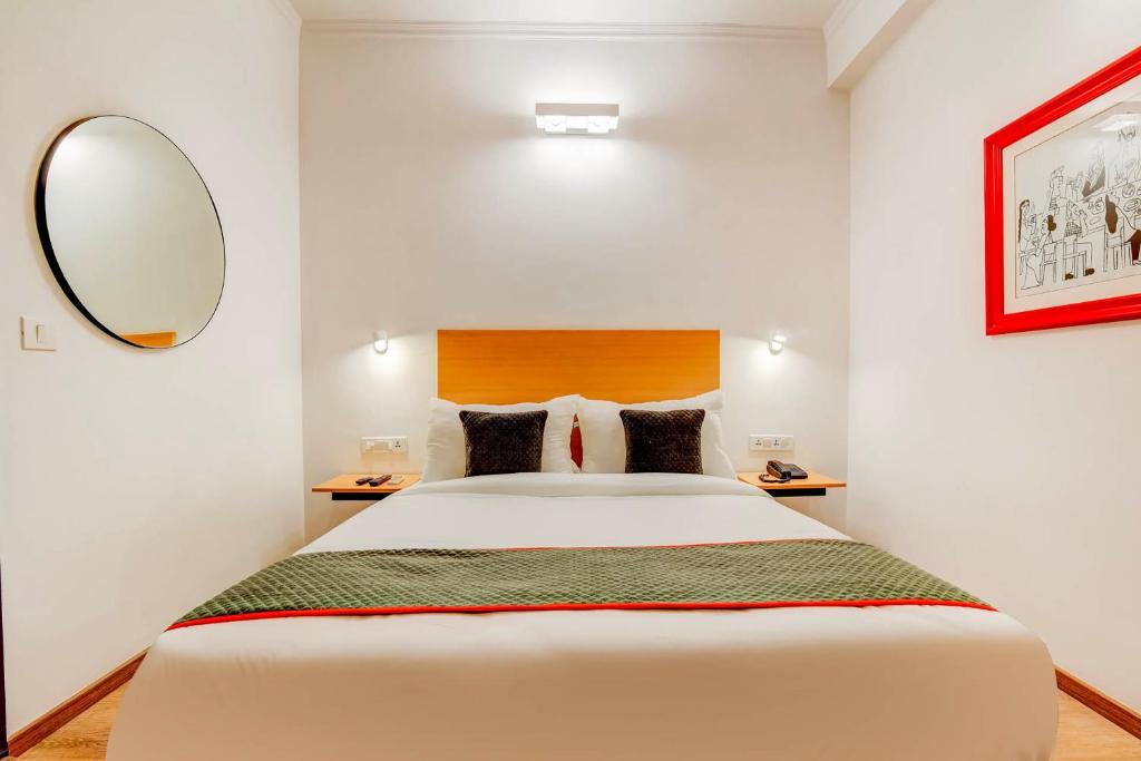 Postel nebo postele na pokoji v ubytování Hotel O Star Key