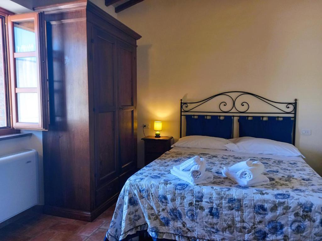 Postel nebo postele na pokoji v ubytování Alba su Assisi