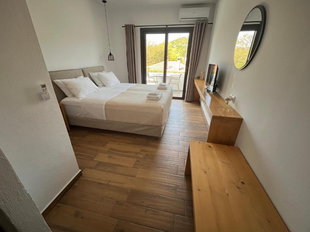 Postel nebo postele na pokoji v ubytování Golden Evelyn