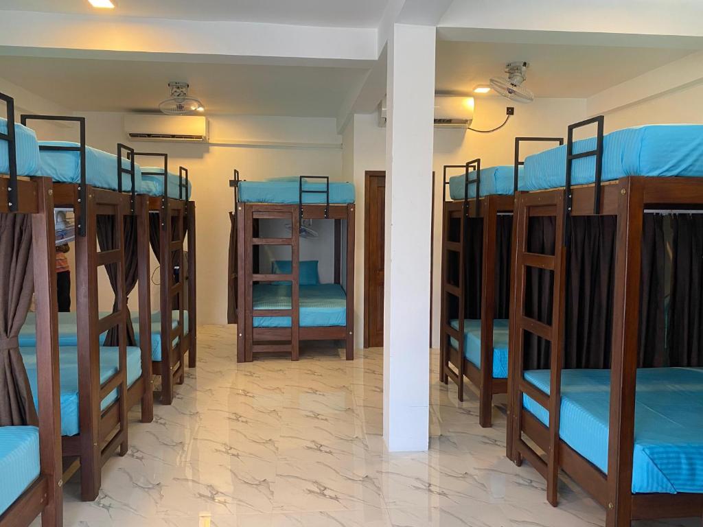 Postel nebo postele na pokoji v ubytování Trinco Beach Resort