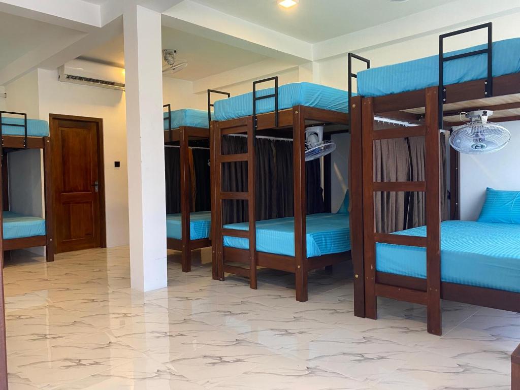 Postel nebo postele na pokoji v ubytování Trinco Beach Resort