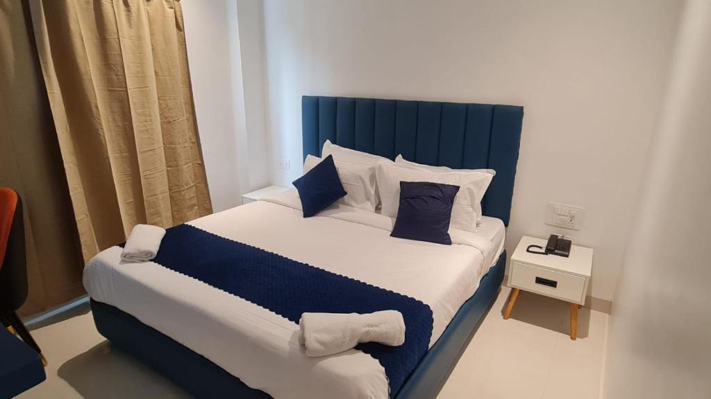 Postel nebo postele na pokoji v ubytování Brigade Hotels and Resorts