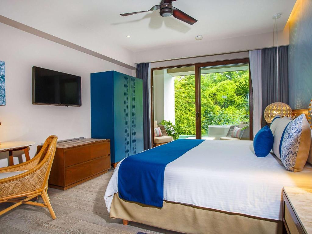 Postel nebo postele na pokoji v ubytování Armony Marival Resort & Spa Punta de Mita - MGallery collection