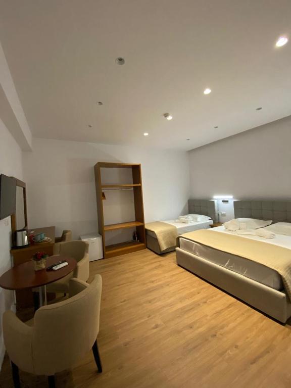 Postel nebo postele na pokoji v ubytování Muko's Apartments