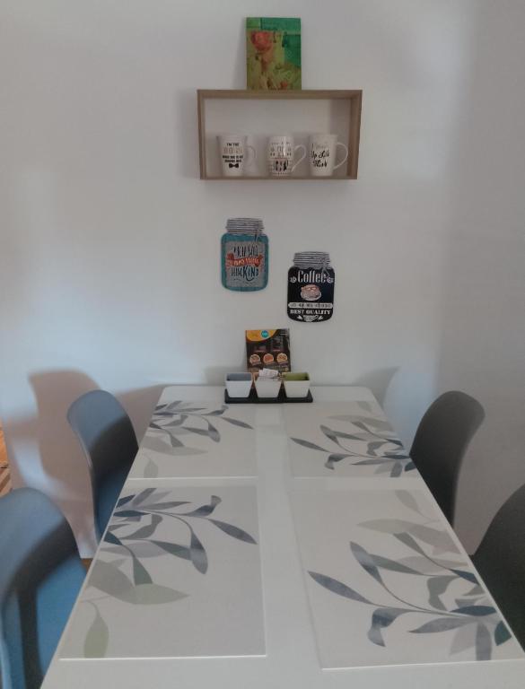 Postel nebo postele na pokoji v ubytování Fina Apartman