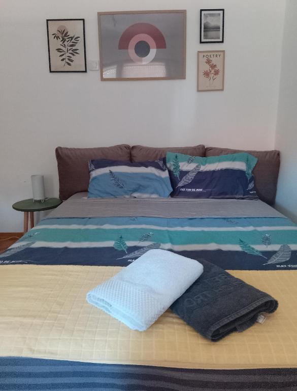 Postel nebo postele na pokoji v ubytování Fina Apartman