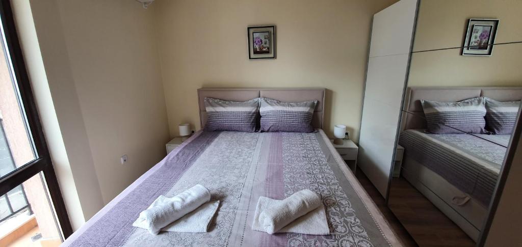 Postel nebo postele na pokoji v ubytování Luxury Apartments Ekaterina