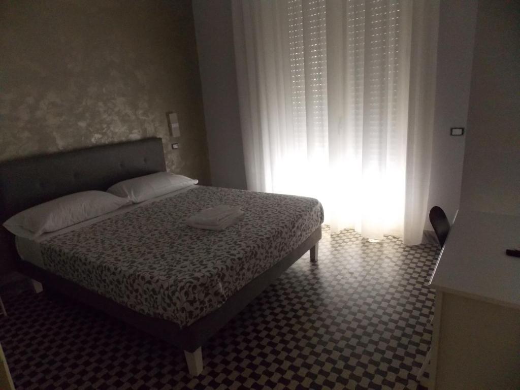 Postel nebo postele na pokoji v ubytování Central Palace
