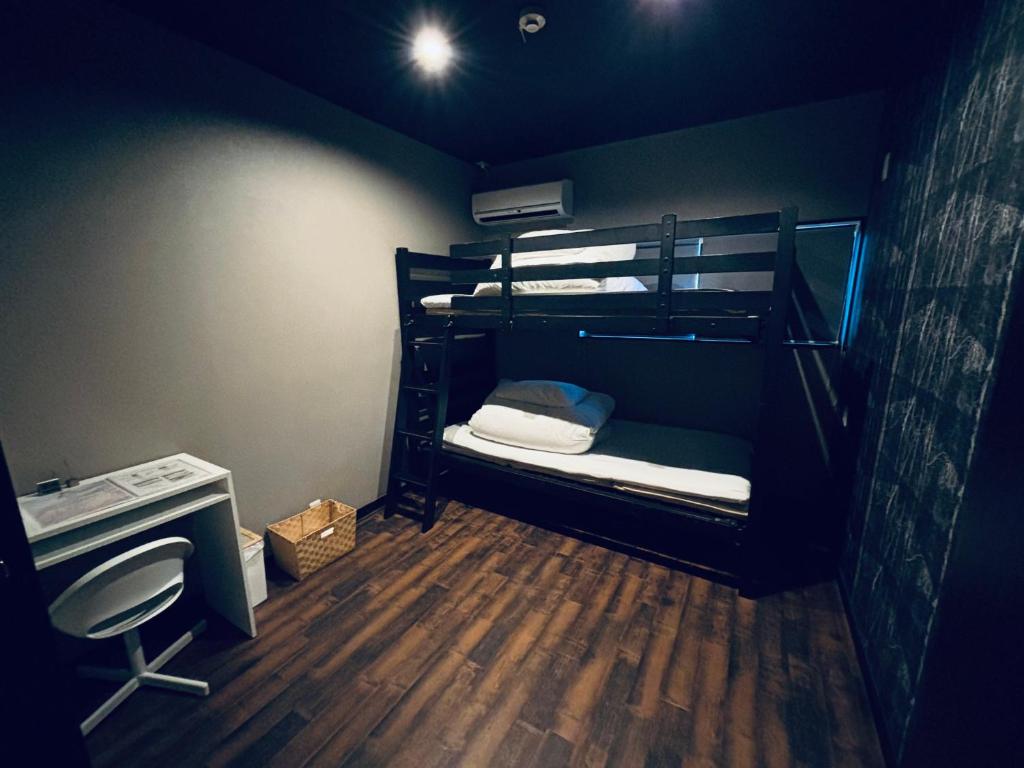 Postel nebo postele na pokoji v ubytování Hostel SAMURISE Mt Fuji
