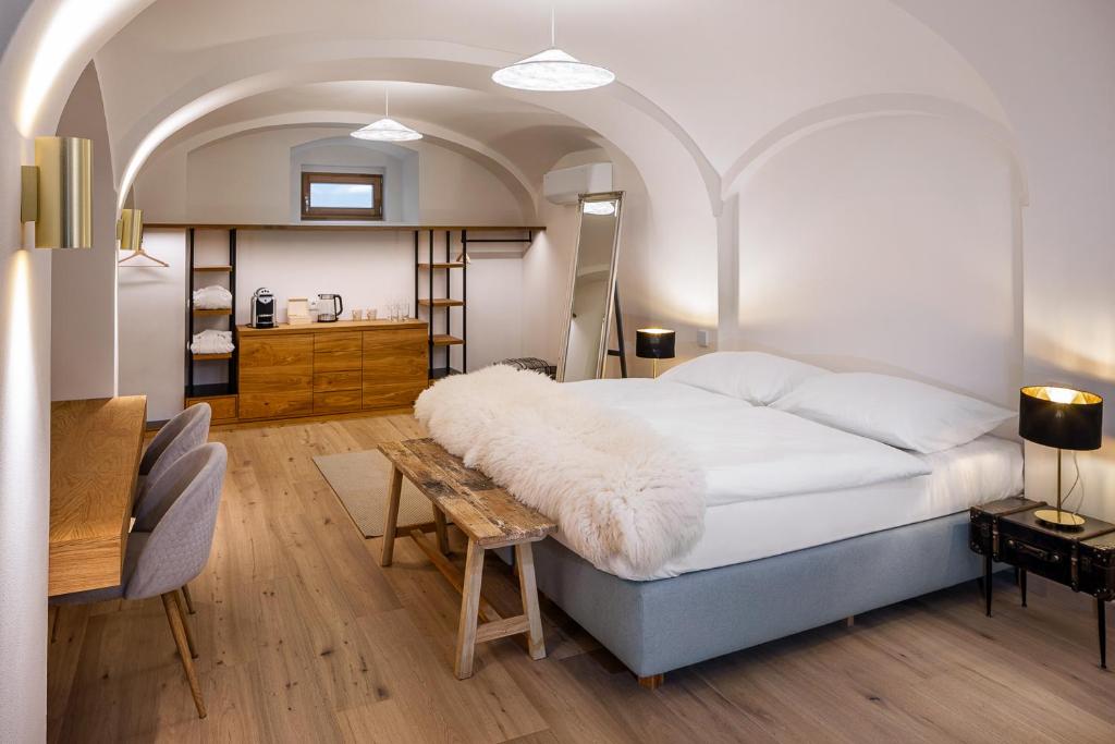 Postel nebo postele na pokoji v ubytování Oblík Resort