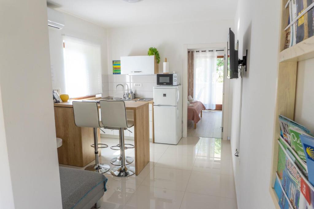 Telewizja i/lub zestaw kina domowego w obiekcie Apartment Jadran Baška