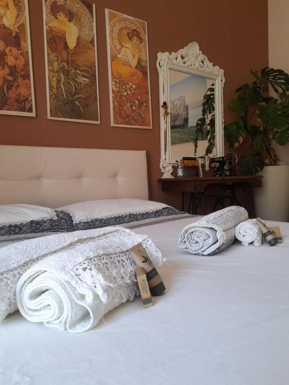 Postel nebo postele na pokoji v ubytování B&B famigliare Arcadia Polignano