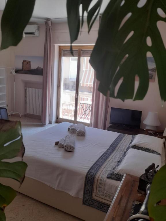 Postel nebo postele na pokoji v ubytování B&B famigliare Arcadia Polignano