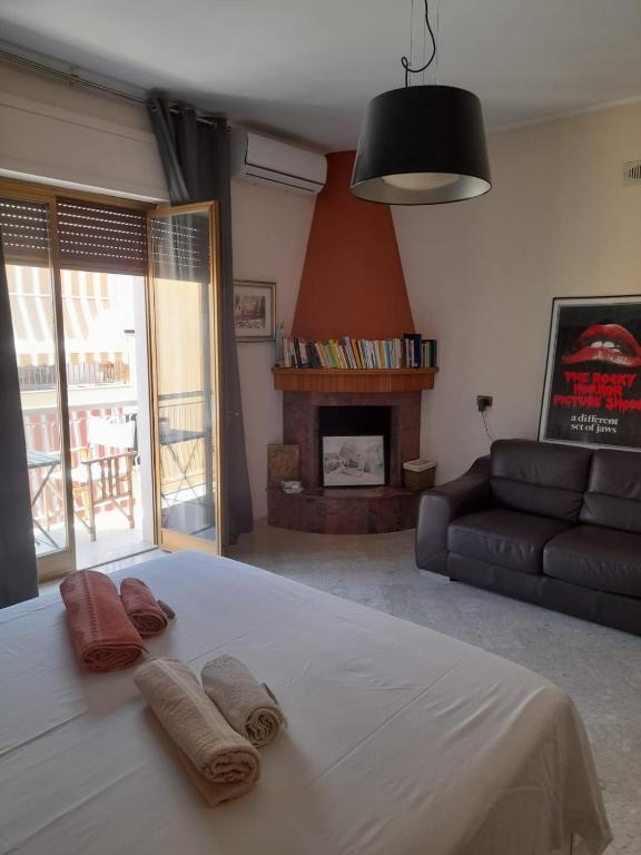 Postel nebo postele na pokoji v ubytování B&B famigliare Arcadia Polignano