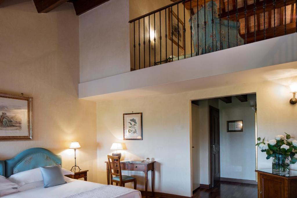 Postel nebo postele na pokoji v ubytování Villa Michelangelo Vicenza – Starhotels Collezione