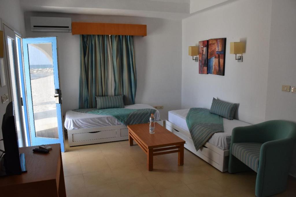 Istumisnurk majutusasutuses Bungalow de Luxe en Bord de Mer a Nabeul