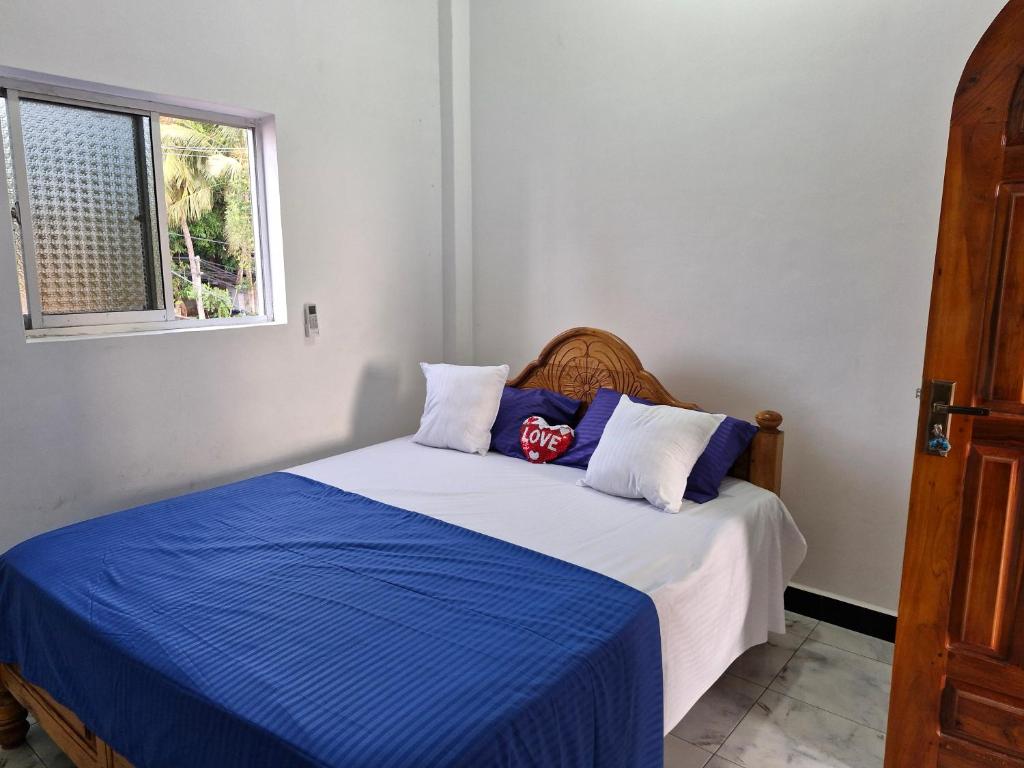 Postel nebo postele na pokoji v ubytování TRINCO VISTARA GUEST House