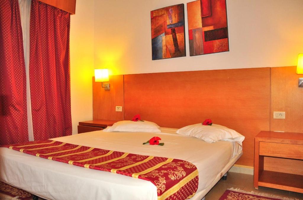 Voodi või voodid majutusasutuse Bungalow de Luxe en Bord de Mer a Nabeul toas