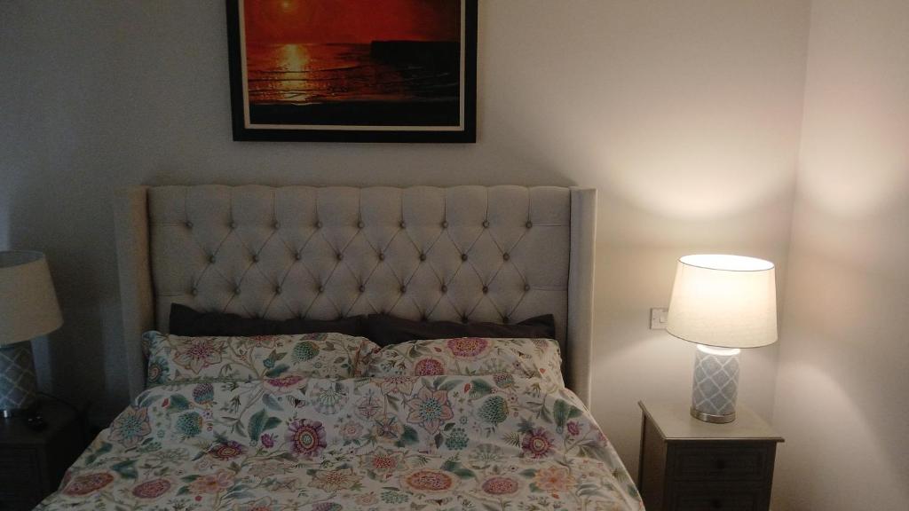 Postel nebo postele na pokoji v ubytování Kitty O'Shea's Guesthouse V94DVH9