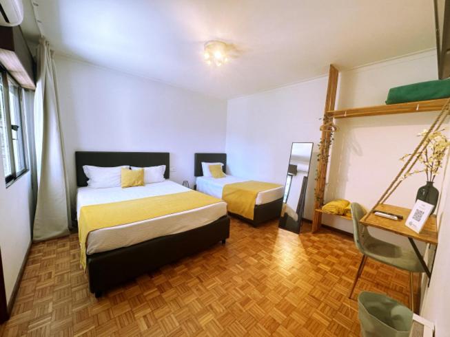 Postel nebo postele na pokoji v ubytování Gerês Guest House