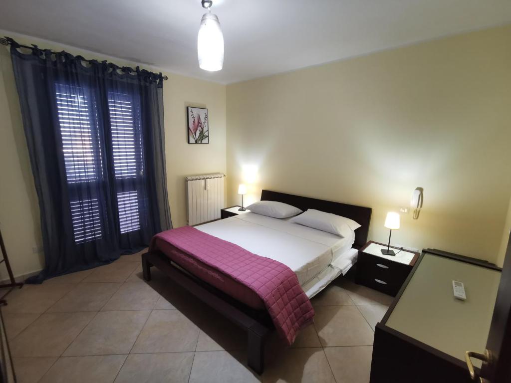 Postel nebo postele na pokoji v ubytování Casa Vitina