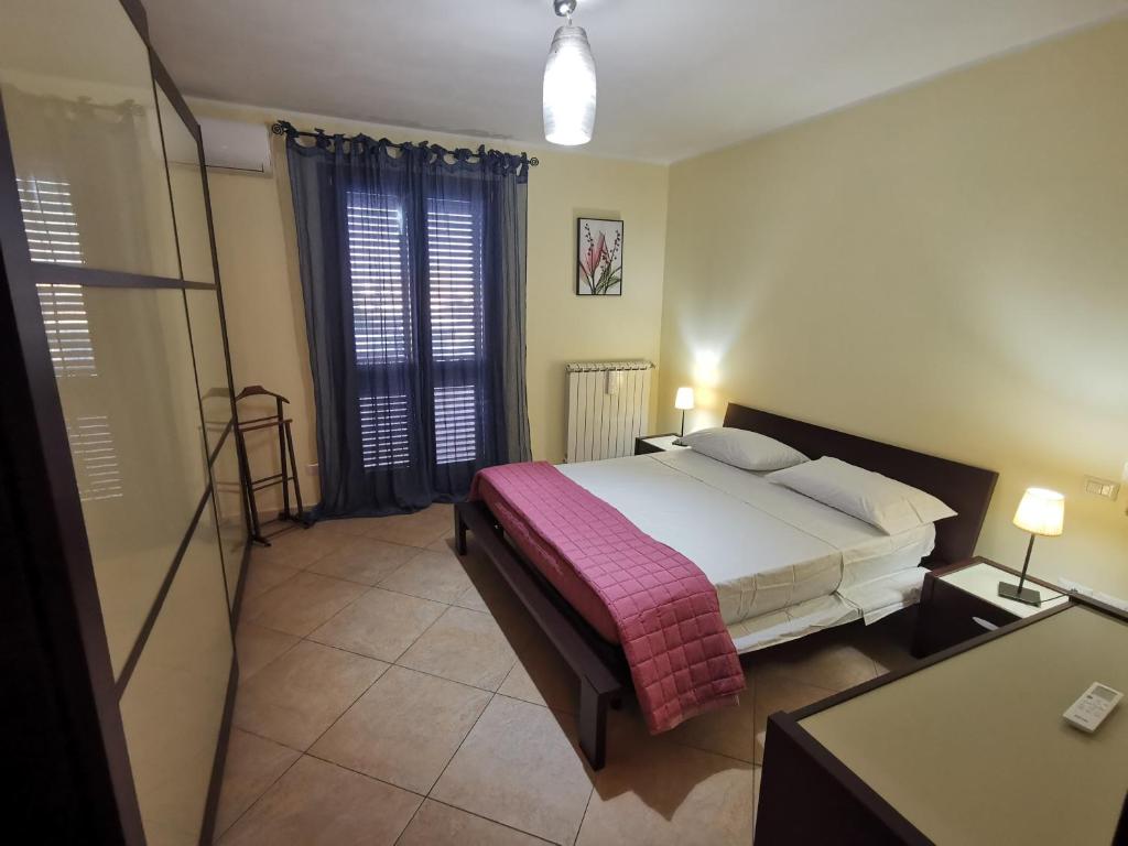 Postel nebo postele na pokoji v ubytování Casa Vitina