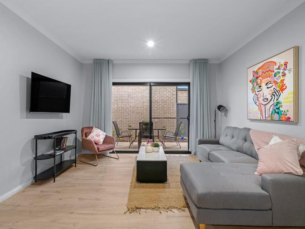 Un televizor și/sau centru de divertisment la 2 Bed Central New townhouse