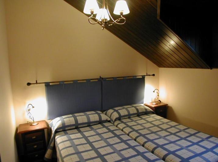 Postel nebo postele na pokoji v ubytování Apartamentos Casa Alcaire