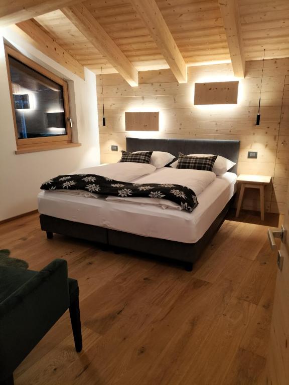 Postel nebo postele na pokoji v ubytování LARIS mountain house