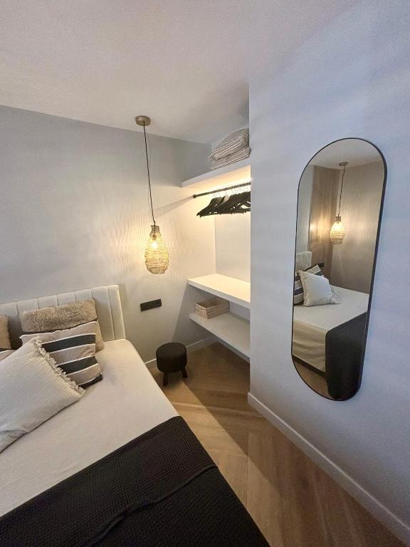 Posteľ alebo postele v izbe v ubytovaní Apartamento Amar - 150m from the Arenal Beach - Private parking - Completely renovated