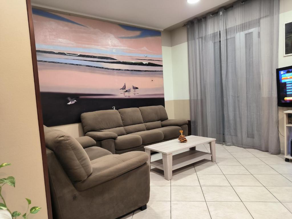 TV a/nebo společenská místnost v ubytování Hotel 4 Lampioni