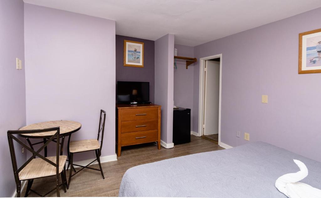Postel nebo postele na pokoji v ubytování Charlroy Motel