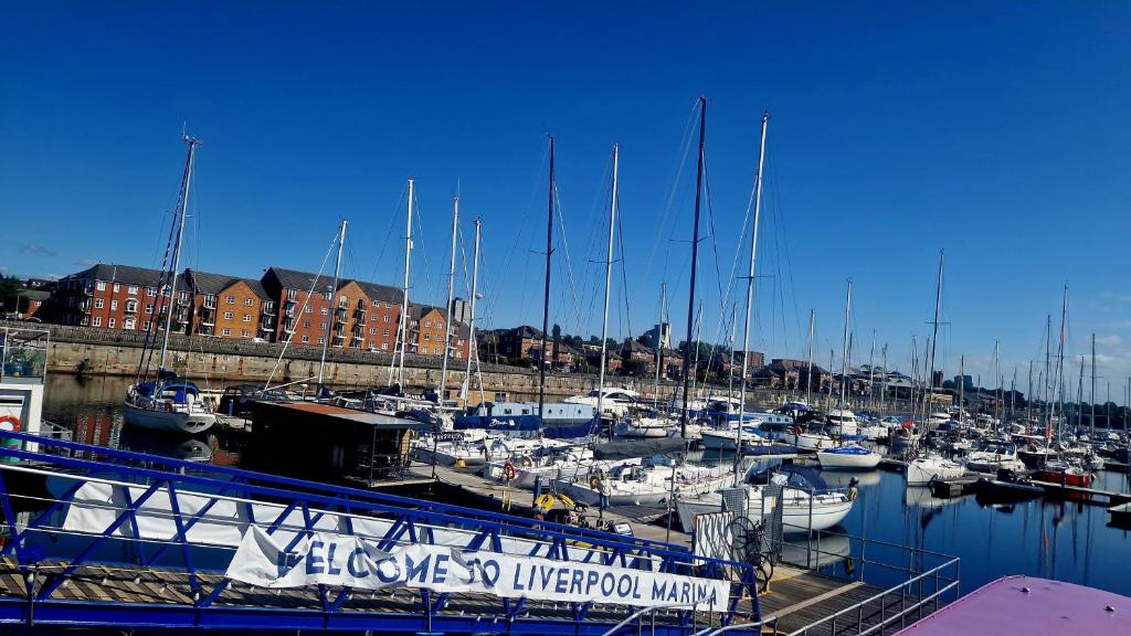 a bunch of boats docked in a marina at Luxury Boat Stay Liverpool sleeping 6 WiFi in Liverpool