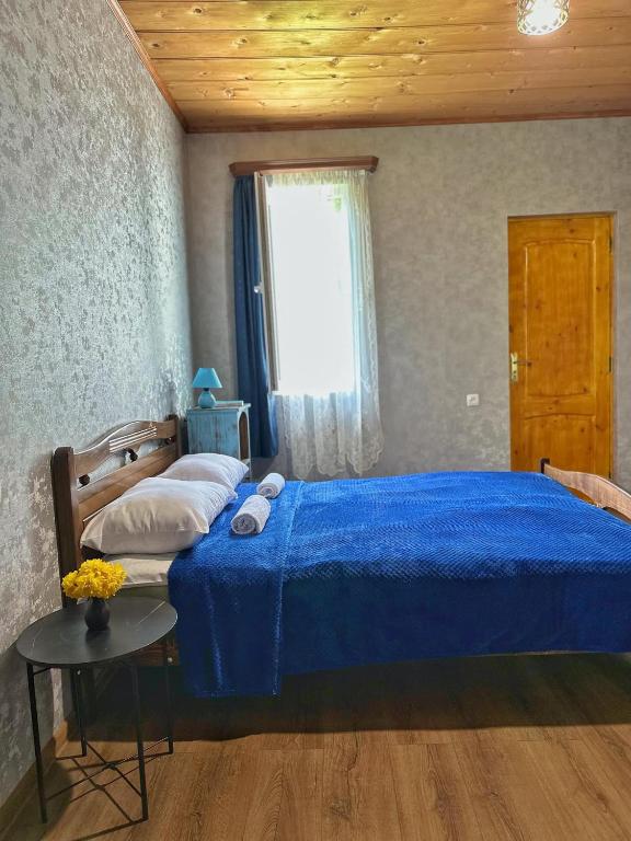Postel nebo postele na pokoji v ubytování guest house zizi