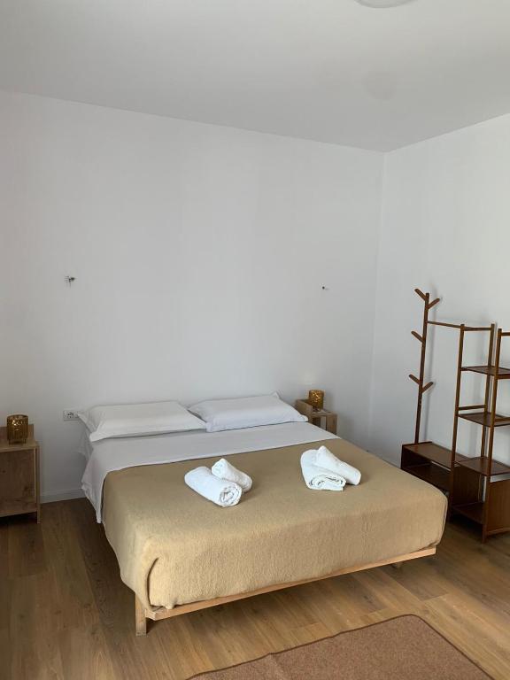 Postel nebo postele na pokoji v ubytování Hotel Vellezrit Guri