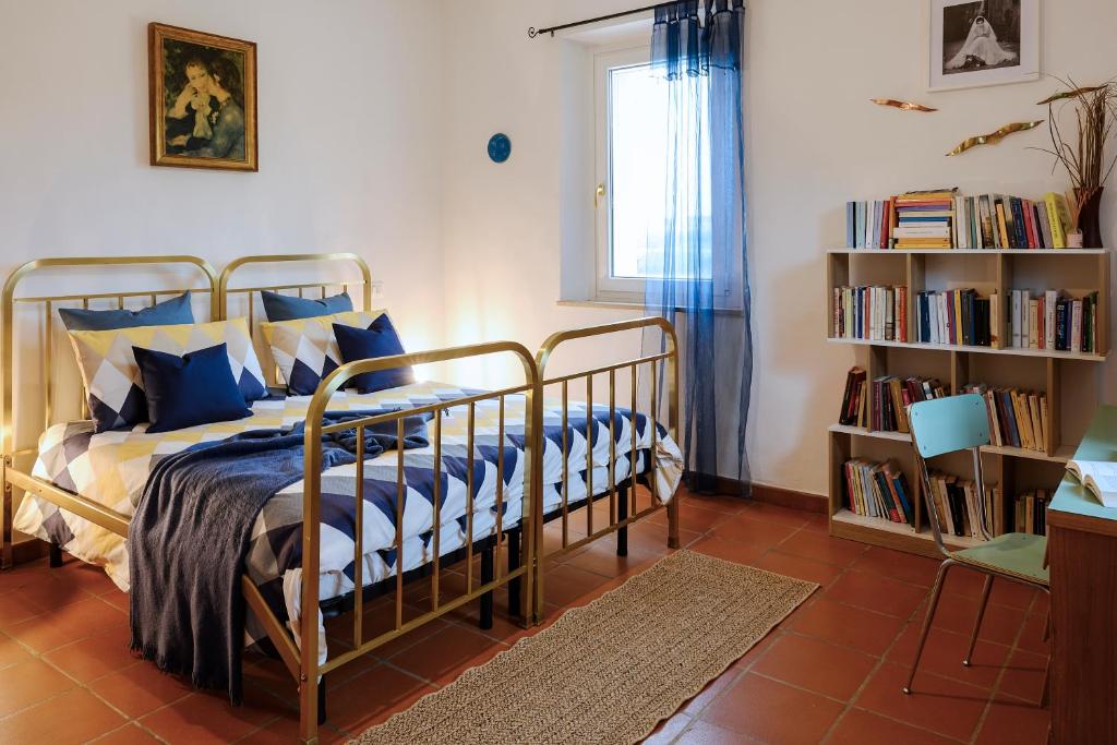 Postel nebo postele na pokoji v ubytování B&B Il Bed and Bookfast