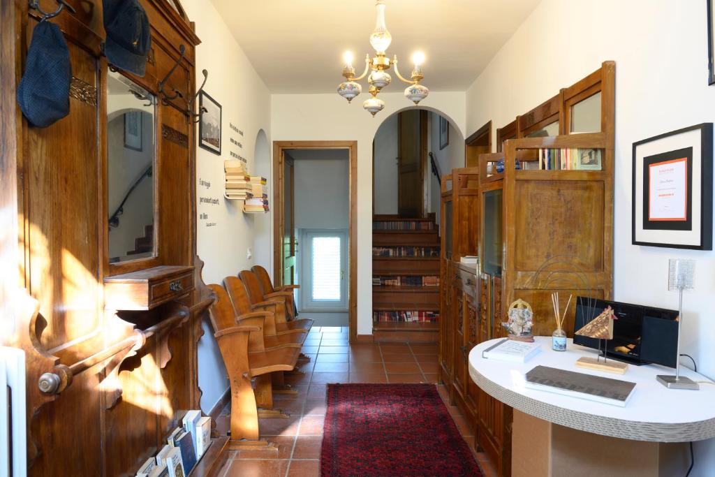 TV a/nebo společenská místnost v ubytování B&B Il Bed and Bookfast