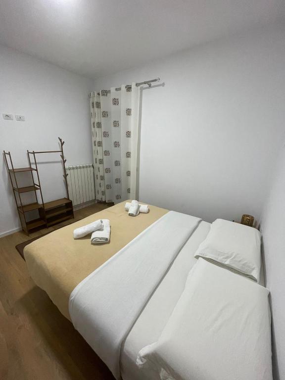 Postel nebo postele na pokoji v ubytování Hotel Vellezrit Guri