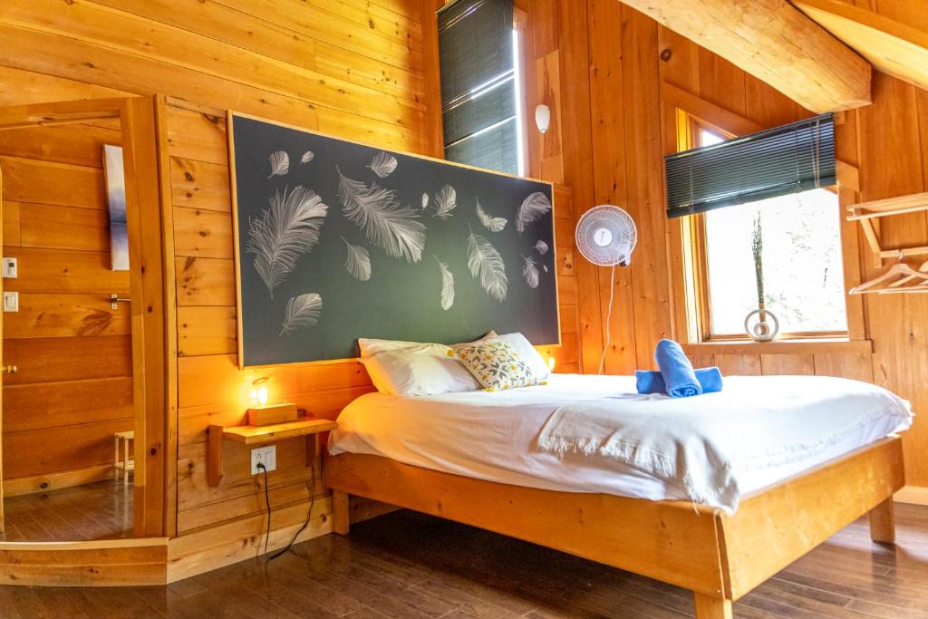 Grande chambre adulte avec parquet acajou Frédérique Legon Pyra