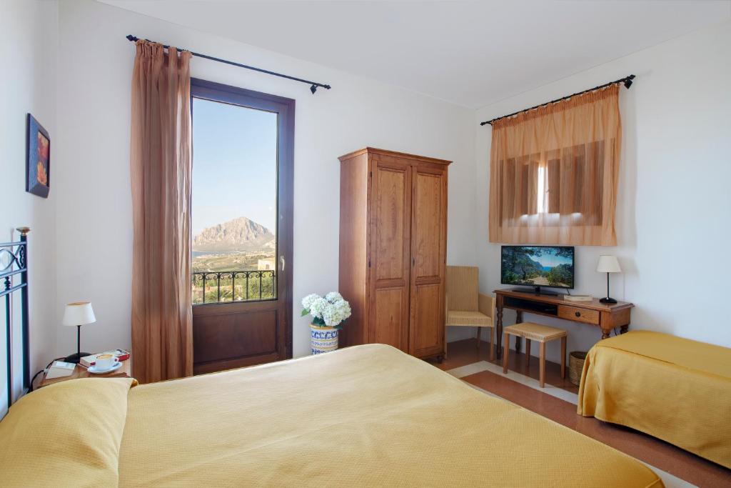 TV a/nebo společenská místnost v ubytování Hotel Baglio Santacroce