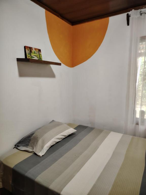 Postel nebo postele na pokoji v ubytování Casa Cristy