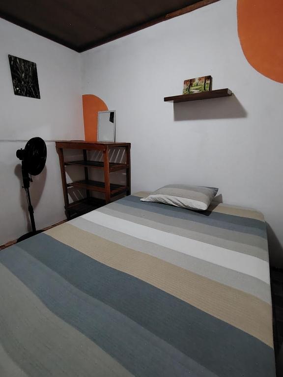 Postel nebo postele na pokoji v ubytování Casa Cristy