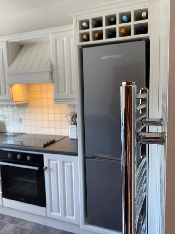 Kuchyň nebo kuchyňský kout v ubytování Trábréaga Cottage